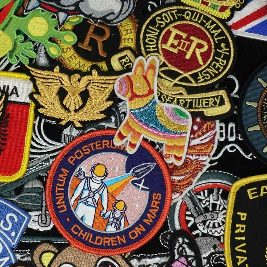 Collection of various custom patches with different designs and text.